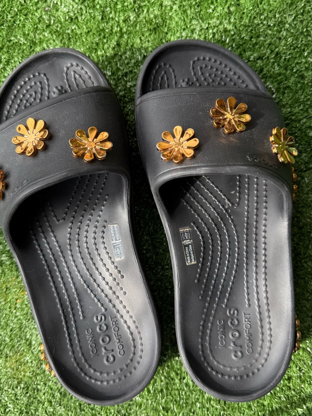 Women's Black Slide Sandals with Gold Floral Accents